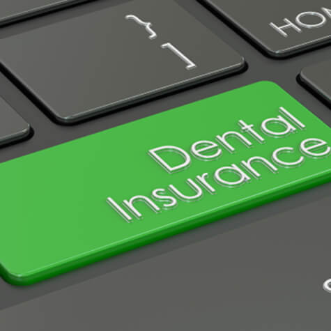 dental insurance key on computer keyboard